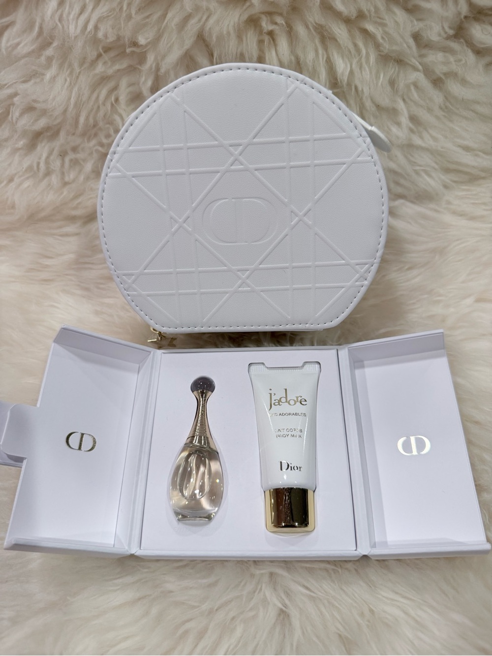 Dior round vanity pouch with perfume and lotion mini gift set